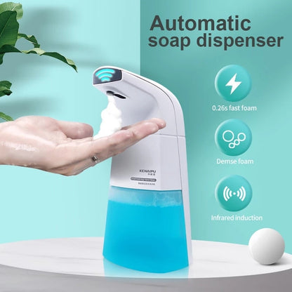 Automatic soap dispenser with a hand reaching out to dispense soap, set against a plain light background.