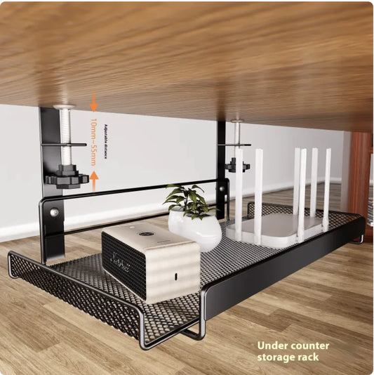 Under counter storage rack with a plant and box on a wooden floor.