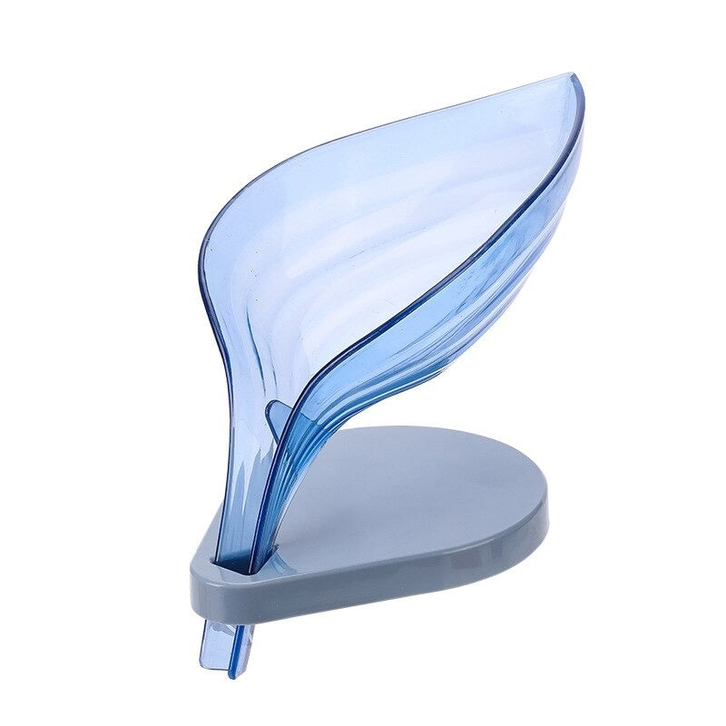 Blue plastic leaf shaped soap holder on a white background