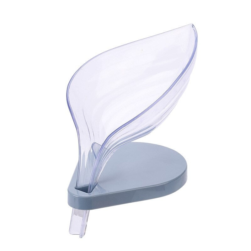 Blue plastic leaf soap dish with a base on a white background