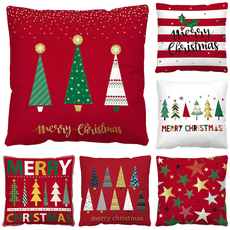 Collection of Christmas themed pillows with festive designs on a white background