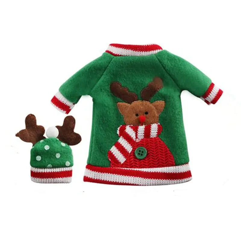 Green sweater with reindeer design and matching hat on a white background