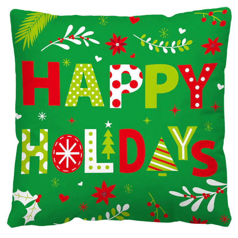 Decorative pillow with 'Happy Holidays' text on a green background