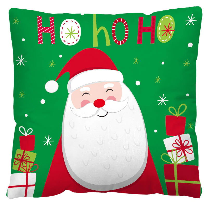 Decorative pillow with Santa Claus illustration and 'HO! HO! HO!' text on a green background.