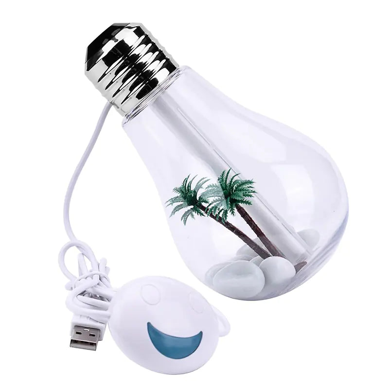 Light bulb shaped device with palm tree design and USB cable on a white background