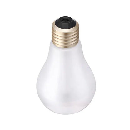 Light bulb shaped humidifier with a gold base on a white background