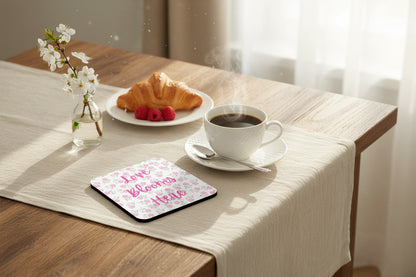 Love Blooms Here floral quote coaster with premium cork backing and waterproof glossy finish for coffee table protection and home decor - Pink - breakfast table