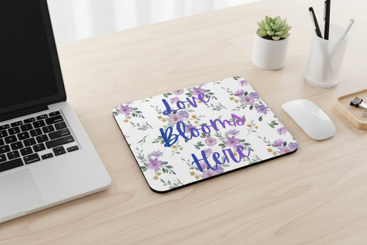 Love Blooms Here inspirational mouse pad with non slip rubber base and smooth polyester surface for gaming, home office, and computer desk workspace decor. Purple and Green - Wood Desk