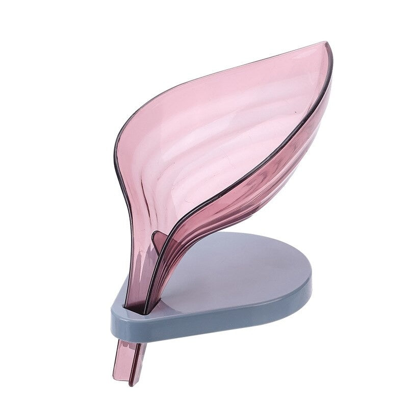 Pink leaf shaped mess free soap dish on a white background