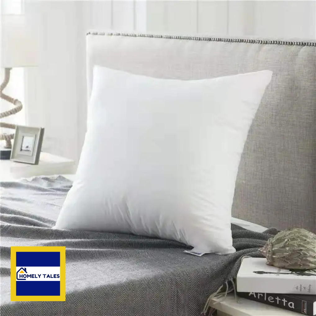 Premium Cotton Velvet Hotel Quality Pillow, Multiple Sizes Available on a bed with a grey headboard and 'Homely Tales' logo.