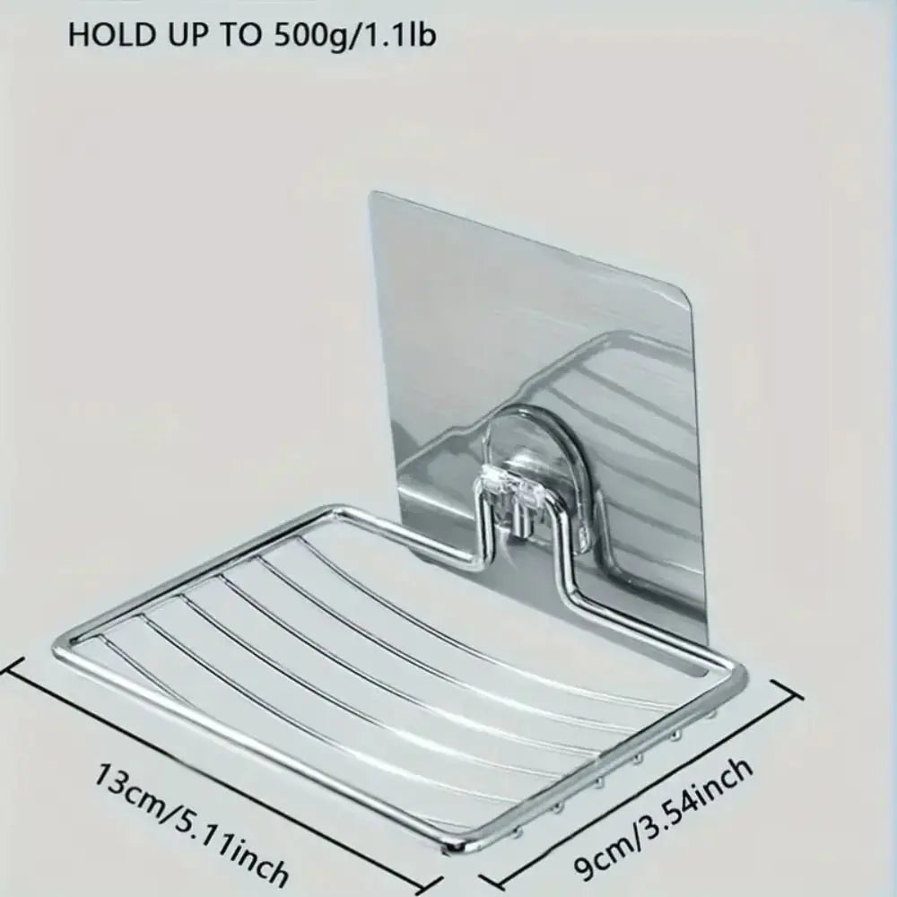 Stainless steel wall mounted soap dish holder with self adhesive backing with dimensions on a light grey background