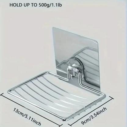 Stainless steel wall mounted soap dish holder with self adhesive backing with dimensions on a light grey background