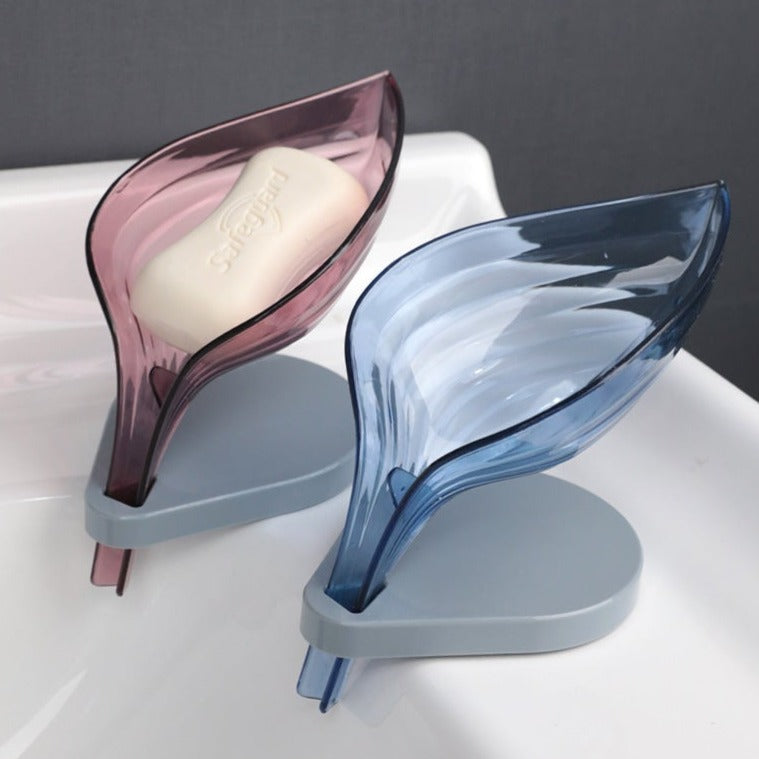 Two leaf soap drain holders attached to bathroom sink
