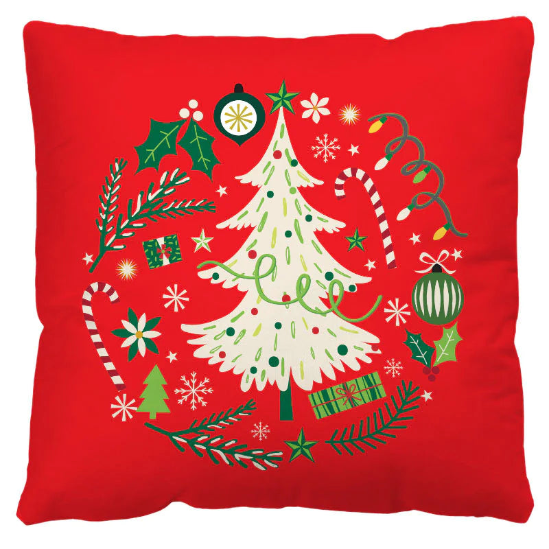 Red pillow with Christmas tree and decorations on a white background