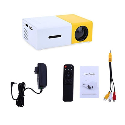 Yellow and white projector with accessories on a white background