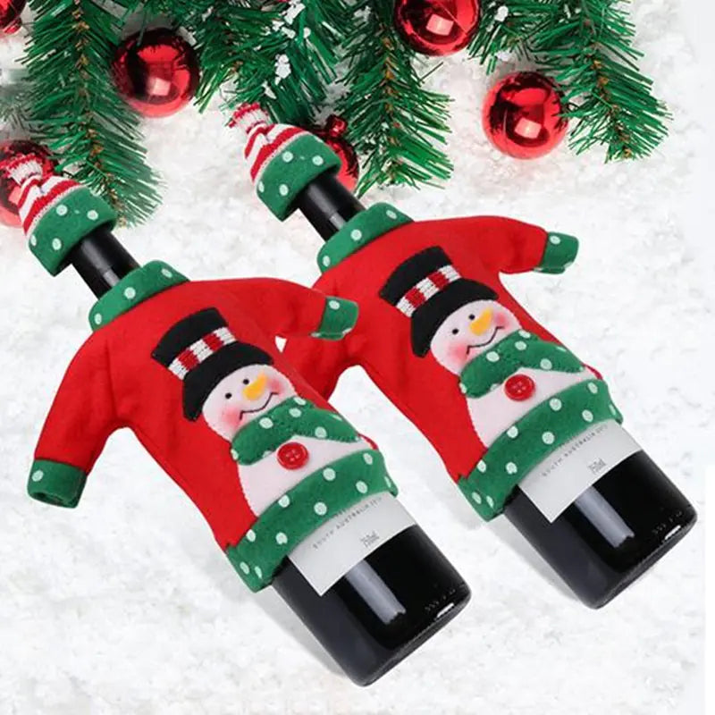Two wine bottles wrapped in festive snowman themed covers against a Christmas tree background.