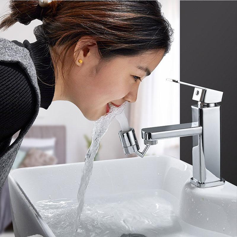 Woman drinking water from the universal rotating faucet splash guard filter with 360 degree swivel feature in a bathroom setting